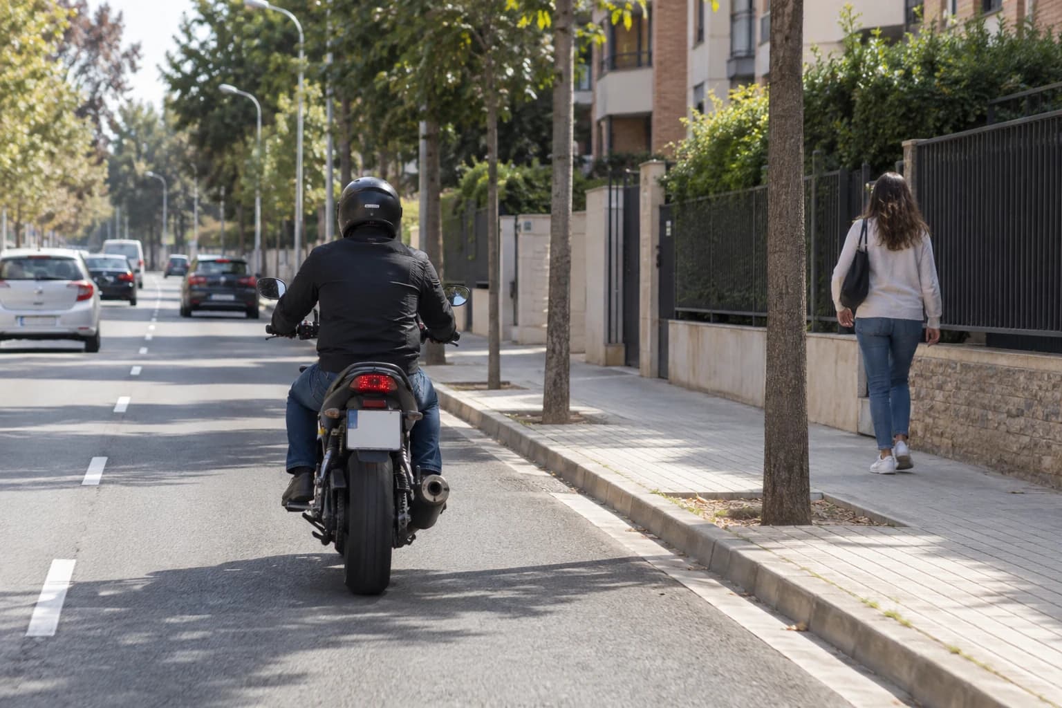 While riding your motorcycle, you notice an acquaintance walking on the pavement. Are you allowed to use the horn to greet them?
