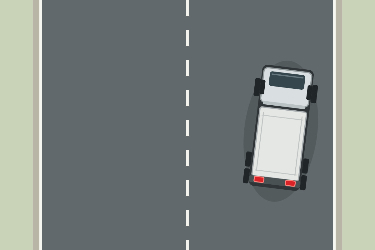 While driving your lorry, you notice that it veers towards one side of the carriageway only when you press the brake pedal. What could this be due to?