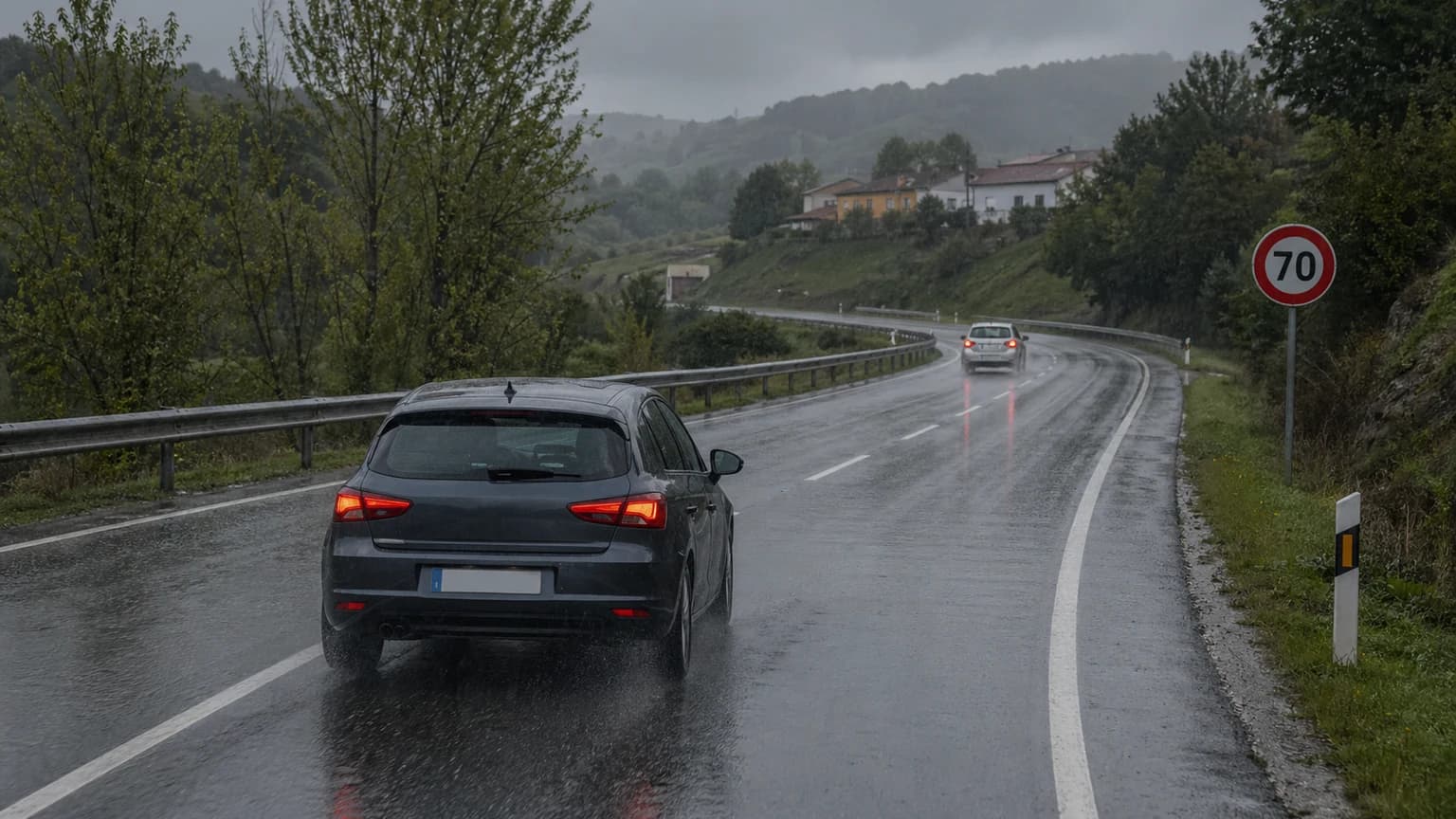 If the road surface is very slippery while driving a passenger car or other vehicle covered by a B licence, the prudent action is to: