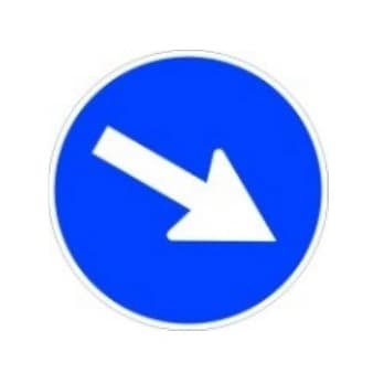 What does the sign in the image placed beside a traffic island indicate?